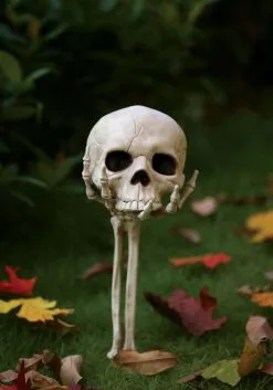 14.5 Inch Skull In Hand Stake Decoration